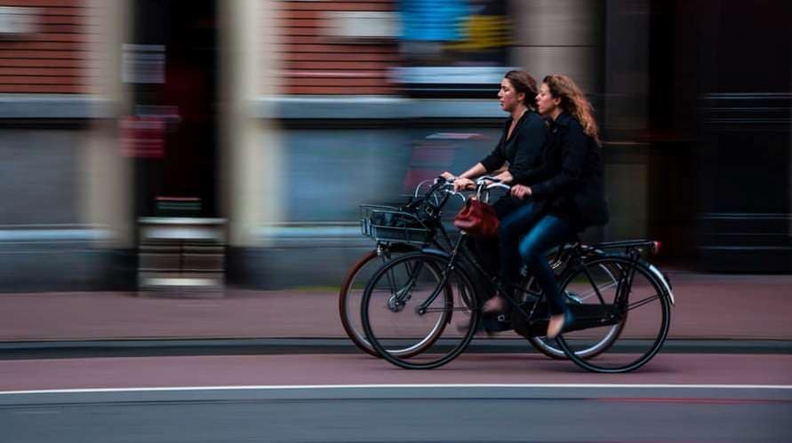 women on bike